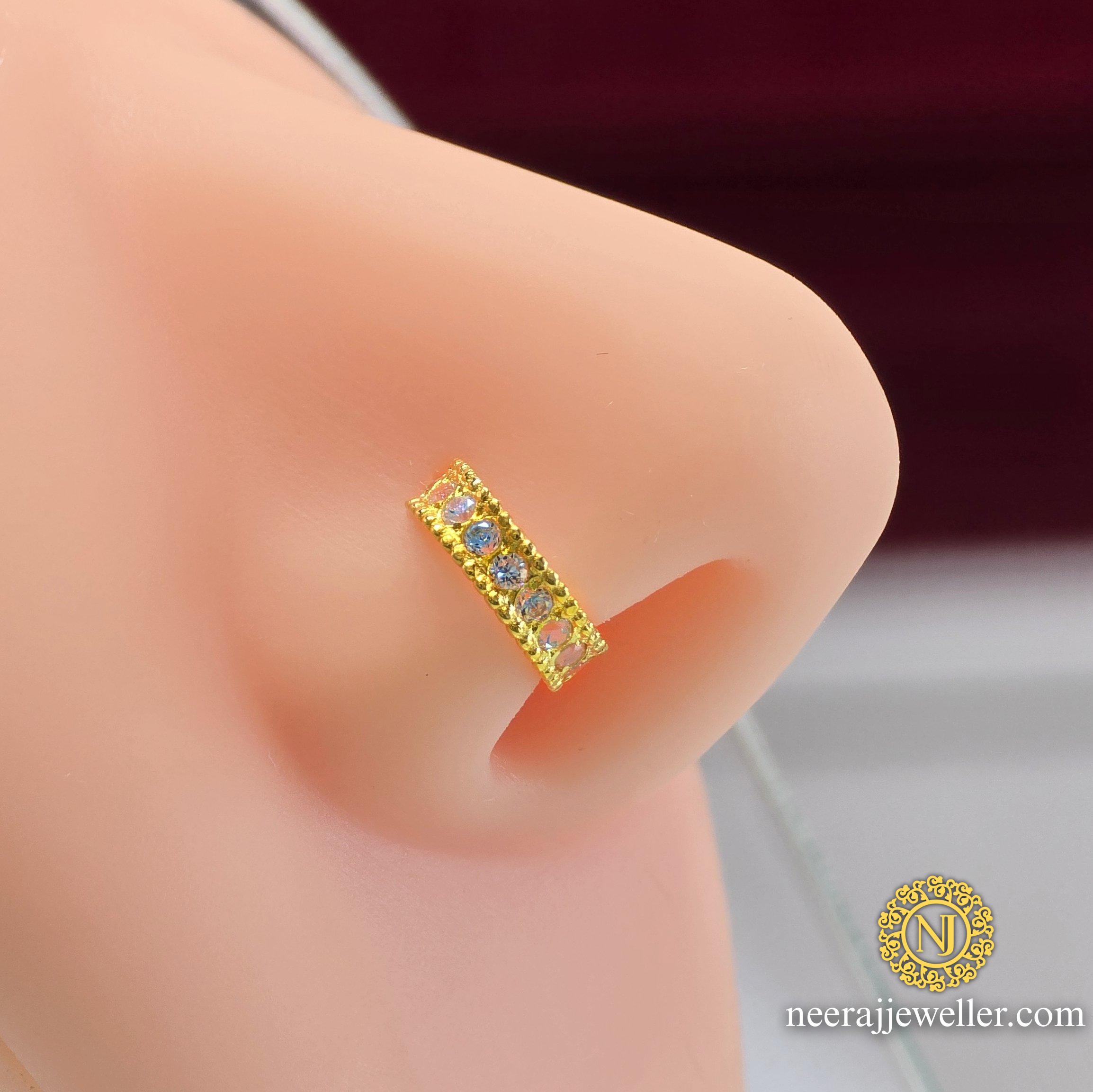 2025/03/1000111426.jpg 18k latest gold nosering design with white stones