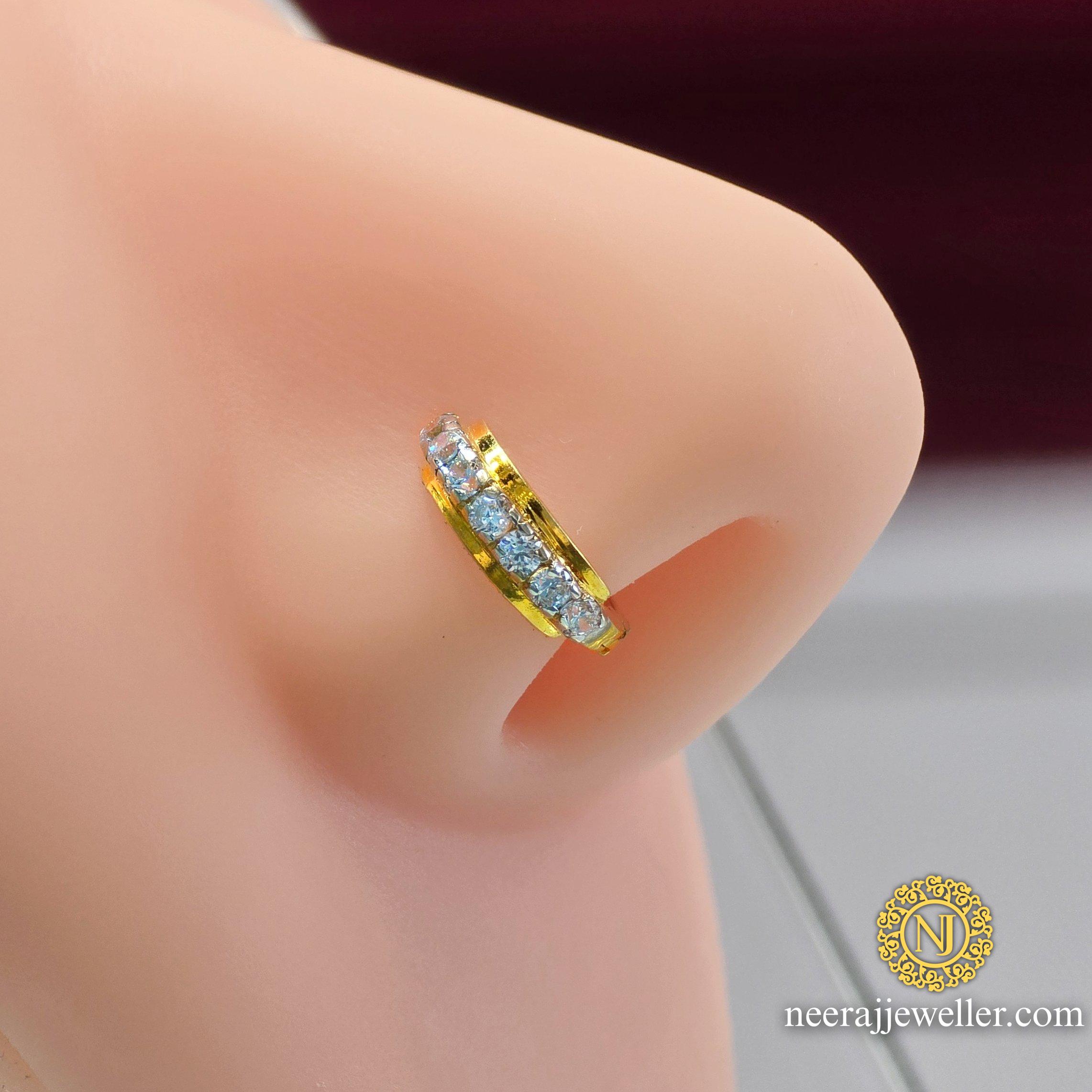 2025/03/1000111428.jpg 14k Gold nosering with high quality stones in heavy weight N13