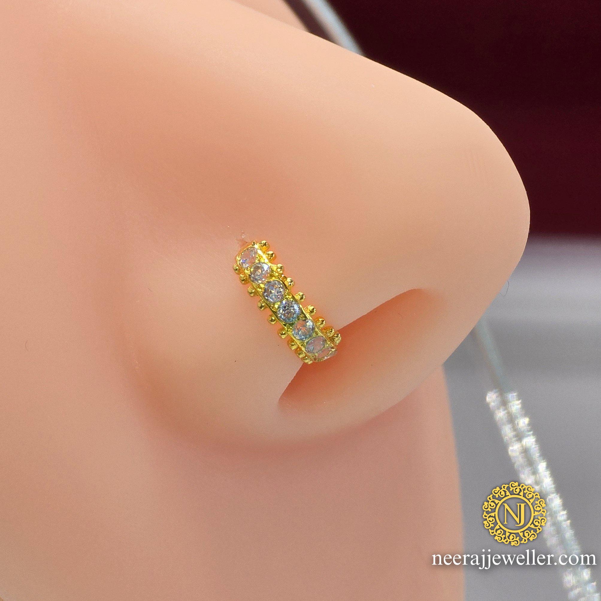 2025/03/1000111915.jpg 18k gold nosering design with white stones