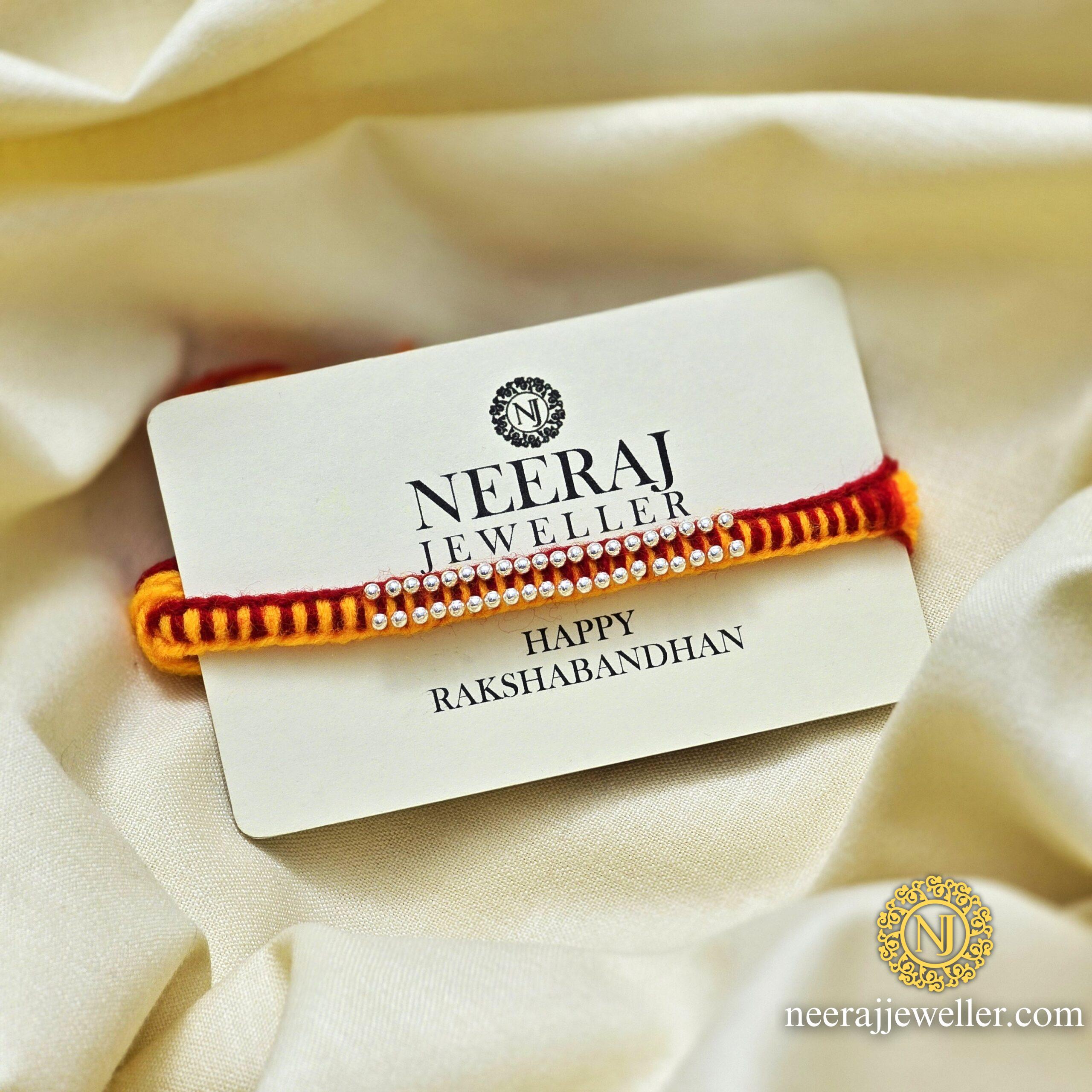 2025/06/1000177679-scaled.jpg Silver rakhi ghungru