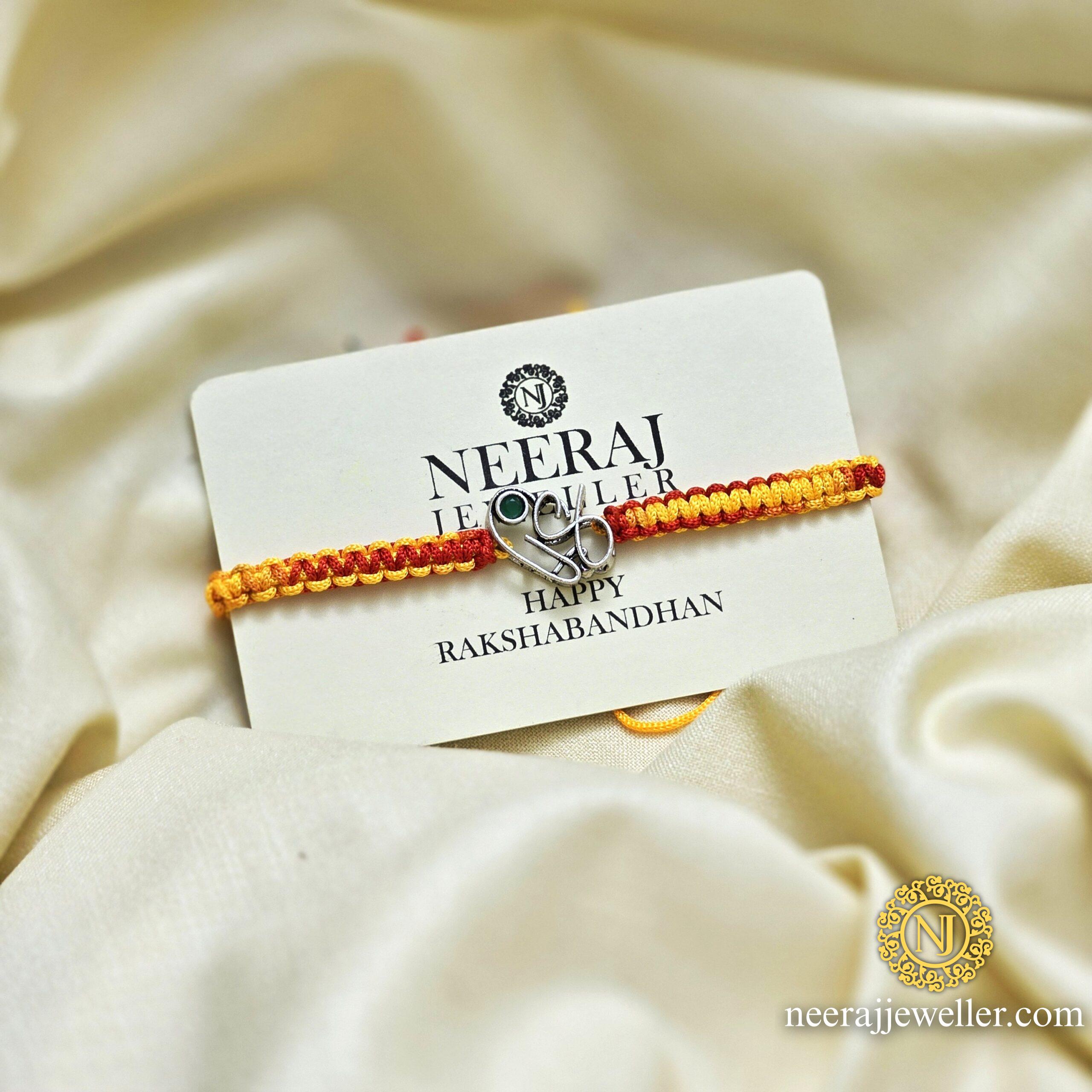 2025/06/1000177682-scaled.jpg silver rakhi oxidised ganesh ji 925