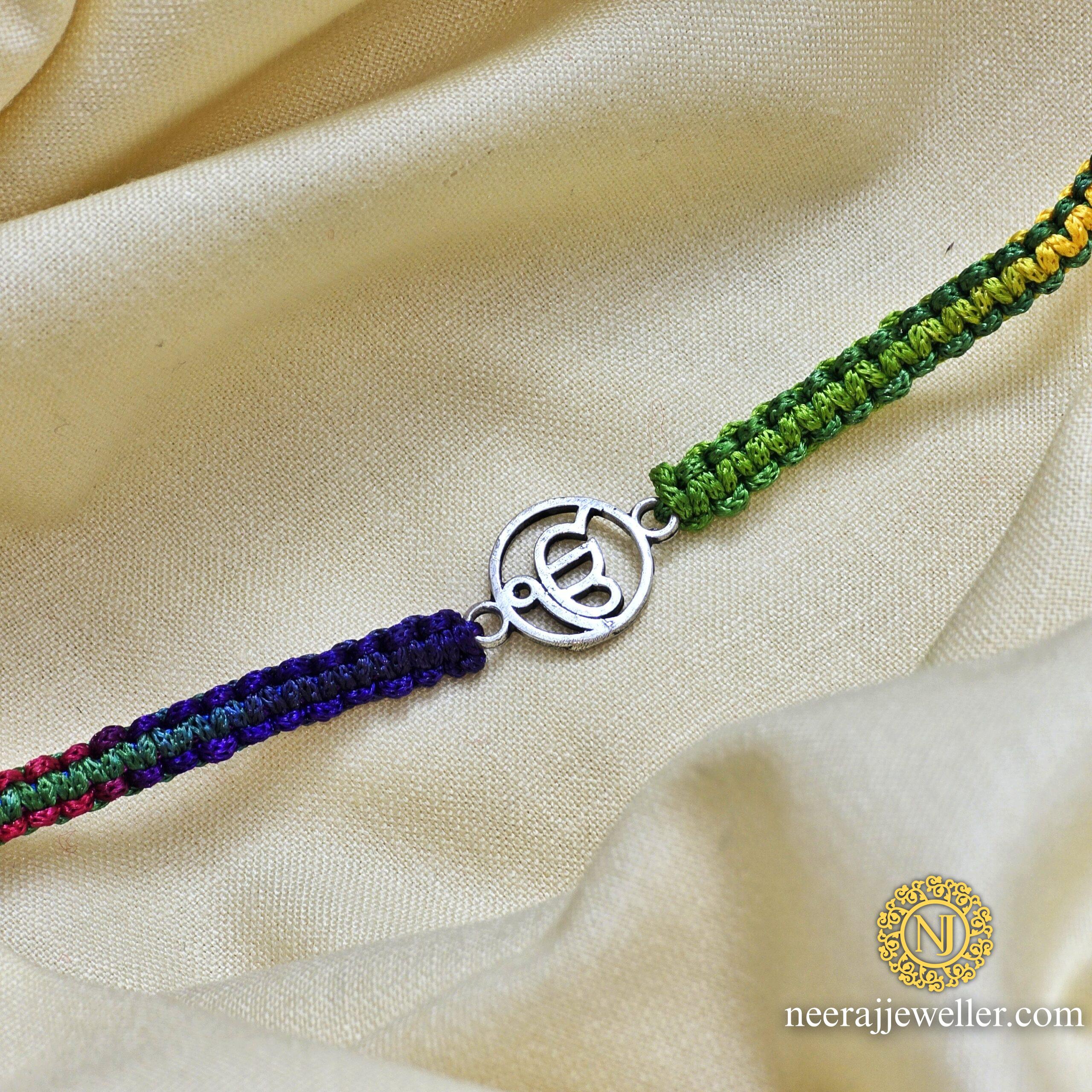 silver rakhi ekonkar oxidised 925